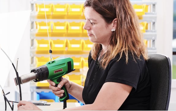 Woman using Leister equipment